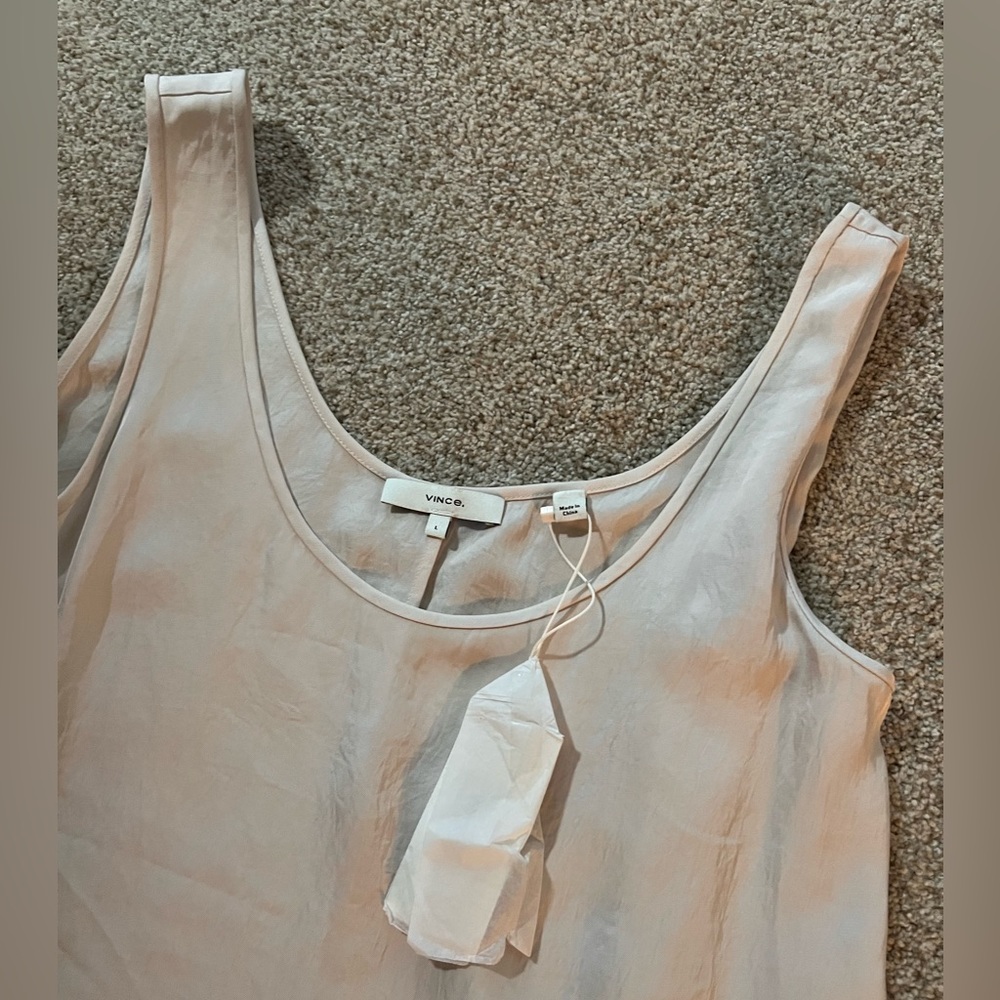 Vince. Brand new tank with tags